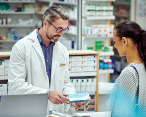pharmacist providing consultation to a woman